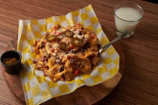 nachos with cheese jalapenos guacamole
